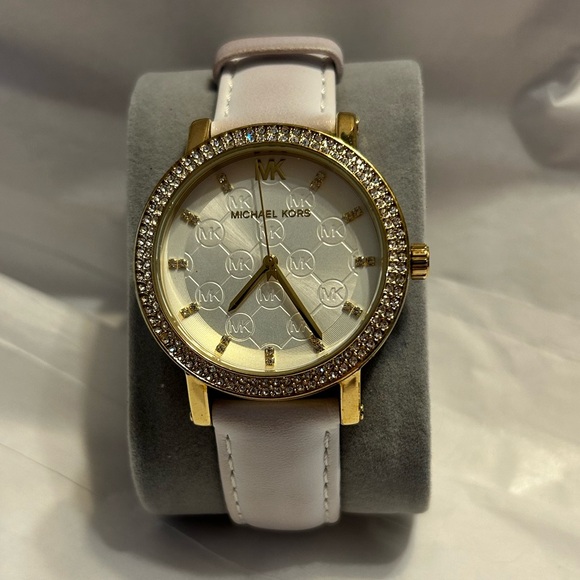 Michael Kors watch good condition. Leather watch band with fade of lavender. - Picture 1 of 8